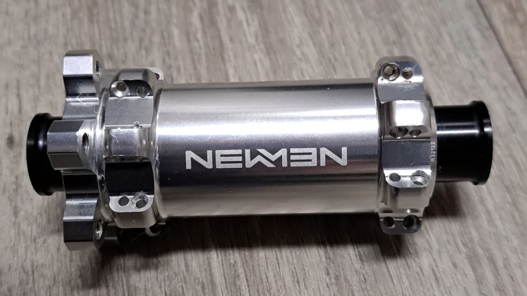Náboje Newmen