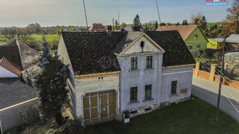 Prodej rodinného domu s pozemky 2418 m², Kunějovice