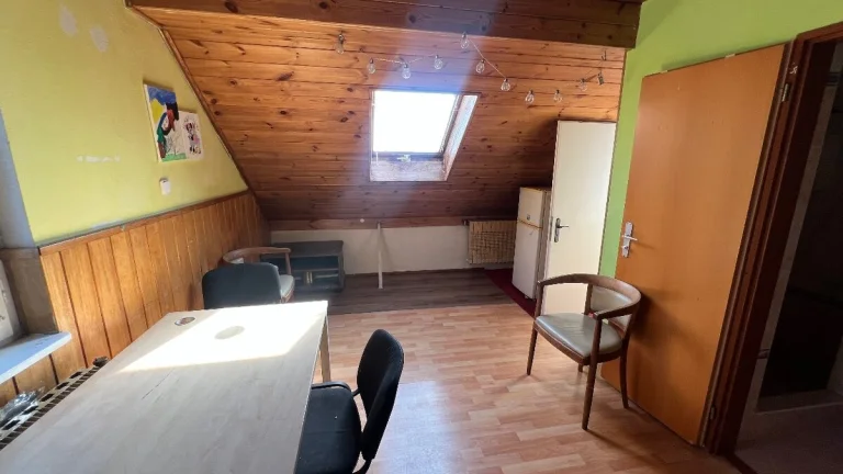 1+1 v domě se zahradou v Krči