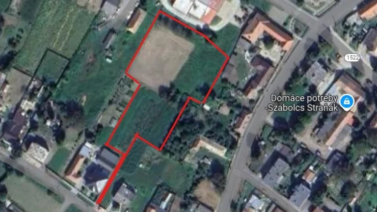 Pozemok 57á v centre obci Farná