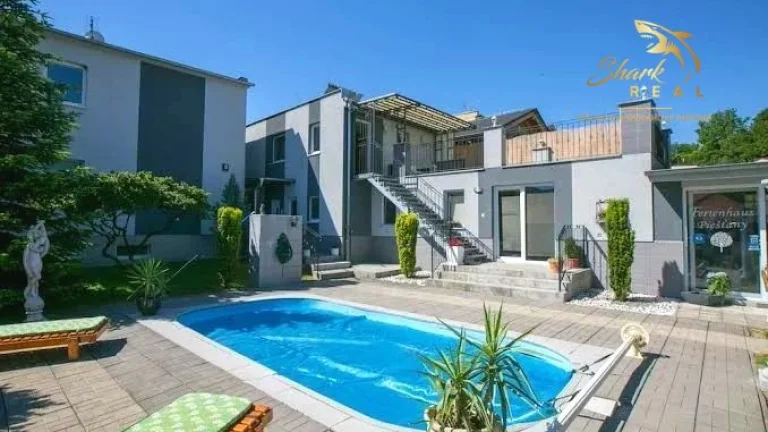 Jedinečná apartmánová nehnutelnosť s bazénom a záhradou