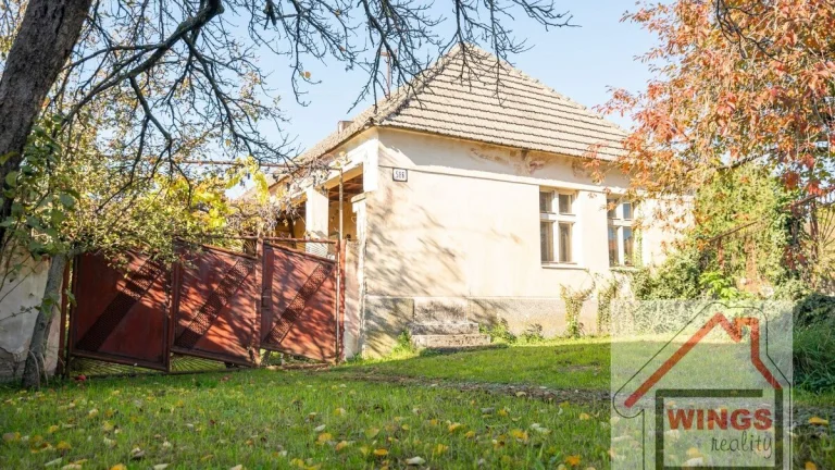 Stavebný pozemok so starším RD v Šintave na ul. Kúpeľná